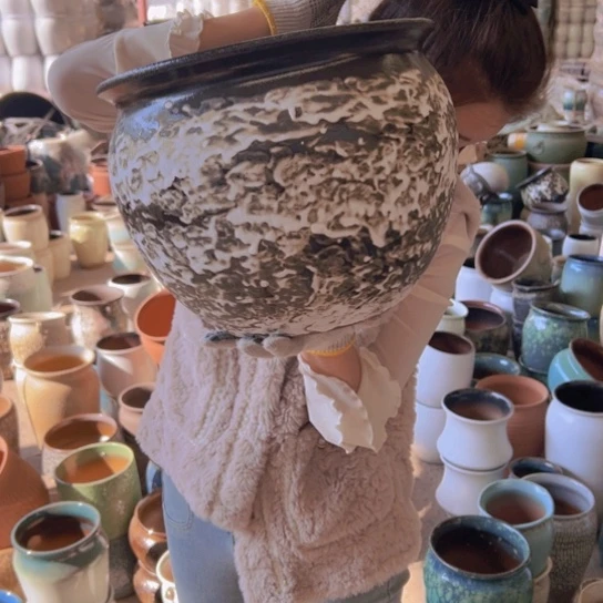 紫砂花盆高24口30。