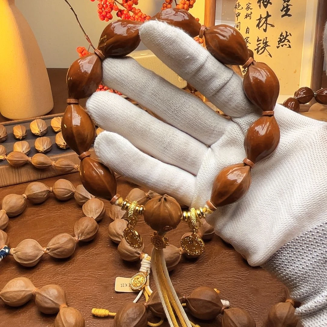 一***月橄榄核手串梅林铁核16*25