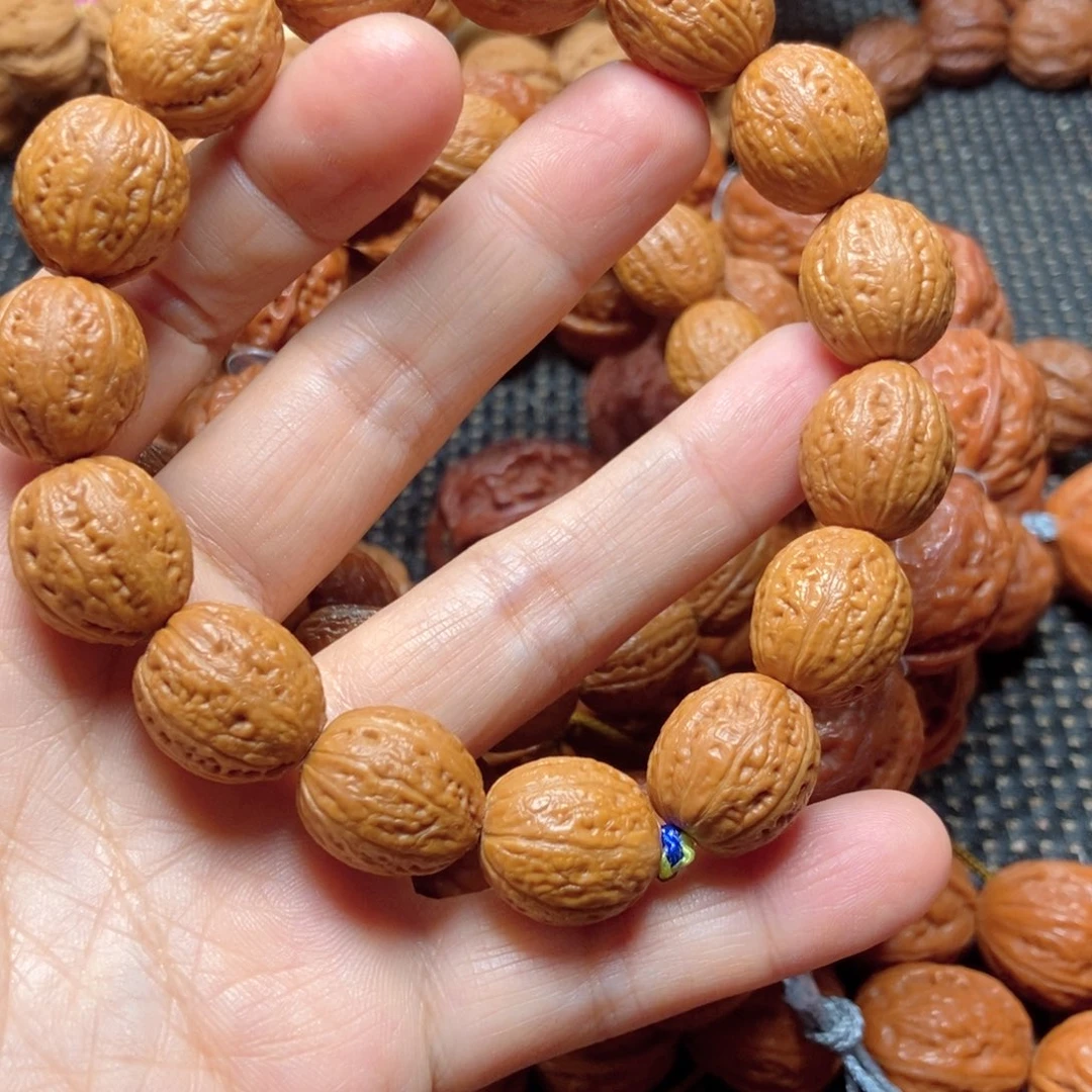 小***泽吊坠文玩核桃光头手串