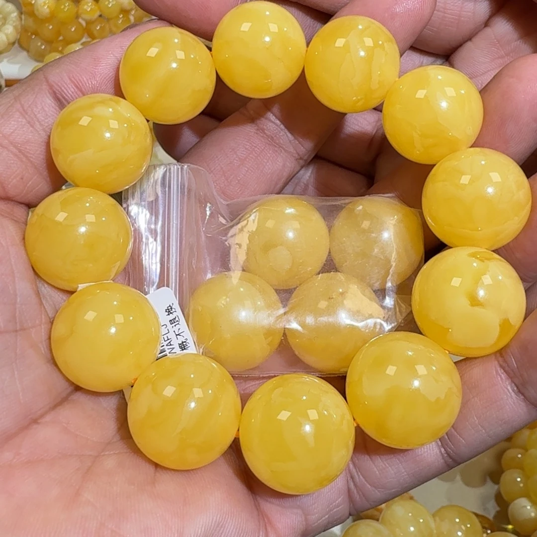 琥珀未镶嵌珠宝奇石19.8m焦皮同料鸡油黄圆珠串53.3克