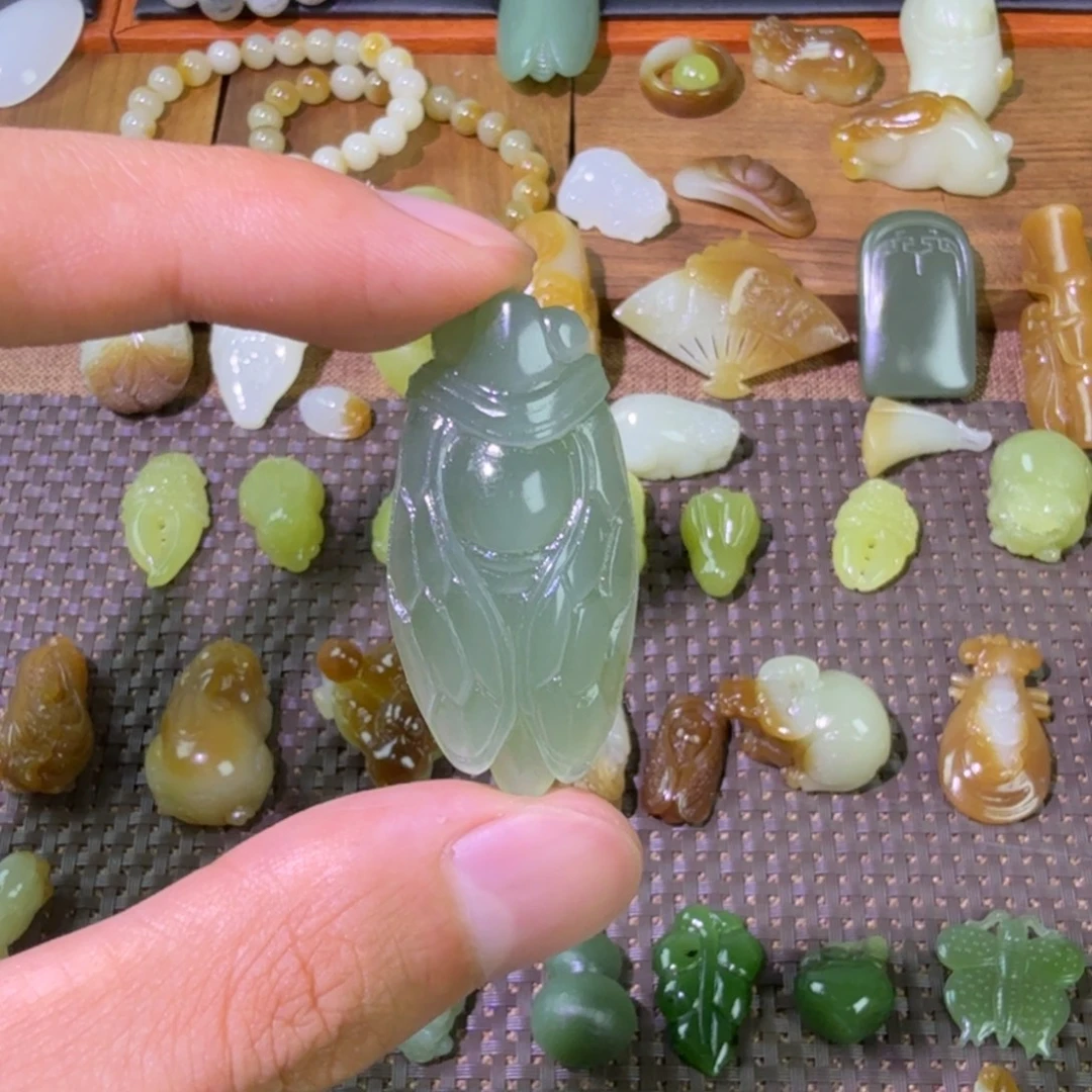 和田玉未镶嵌颈饰俄碧猫眼知了一鸣惊人