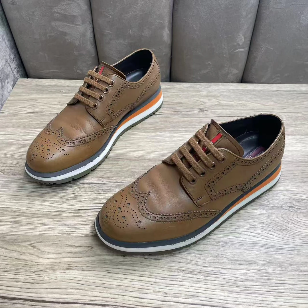 95新 Prada/普拉达 棕色时尚镂空雕花红标厚底皮鞋 40.5码/捡漏