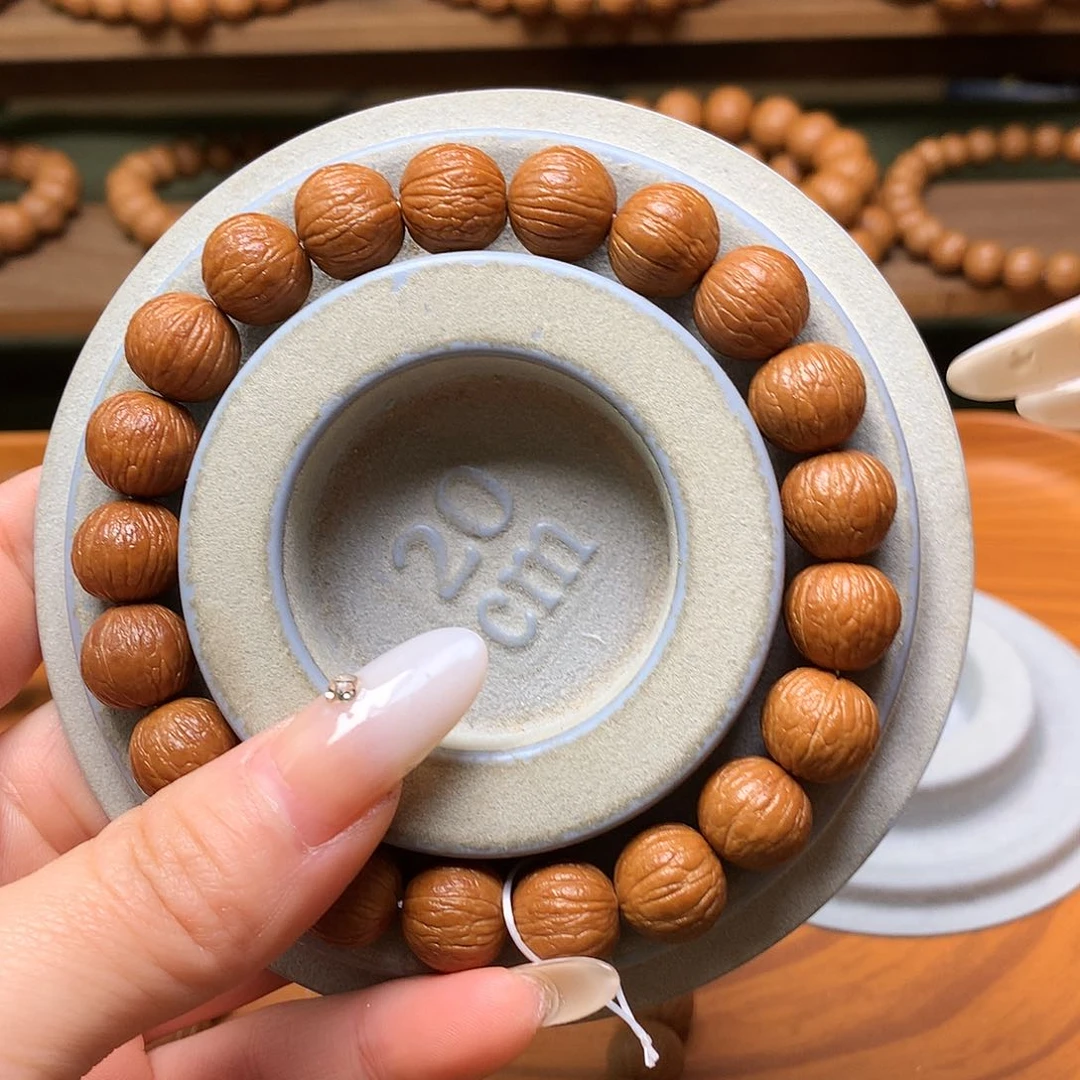 吊坠猴头核桃M***?12同尺风雨