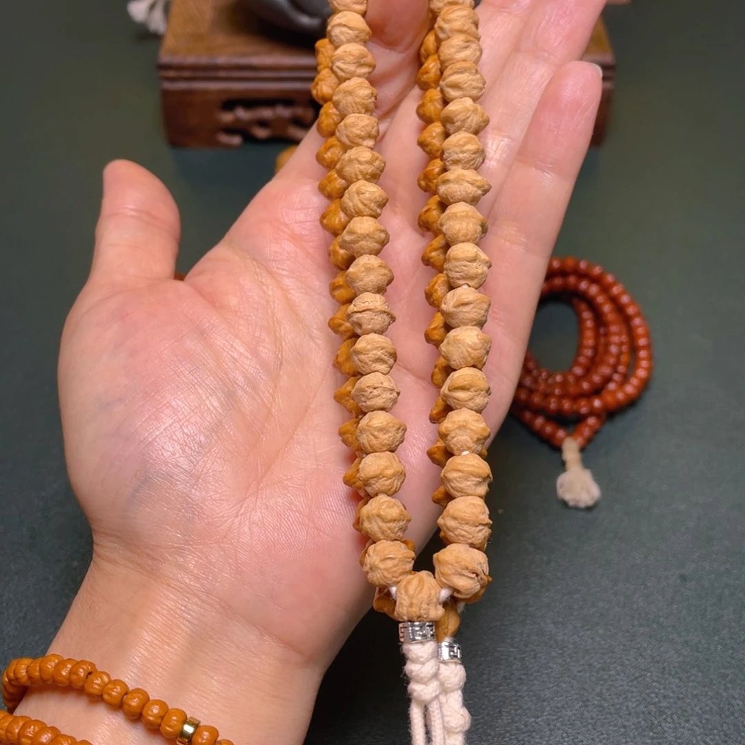 柏香籽/百香籽吊坠新款白牙横打手持