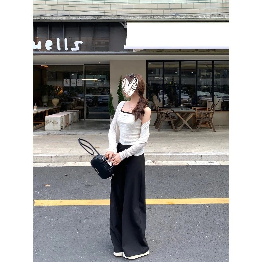 2025年早秋薄款阔腿长裤子女装时尚气质小众设计感黑色弯刀休闲裤
