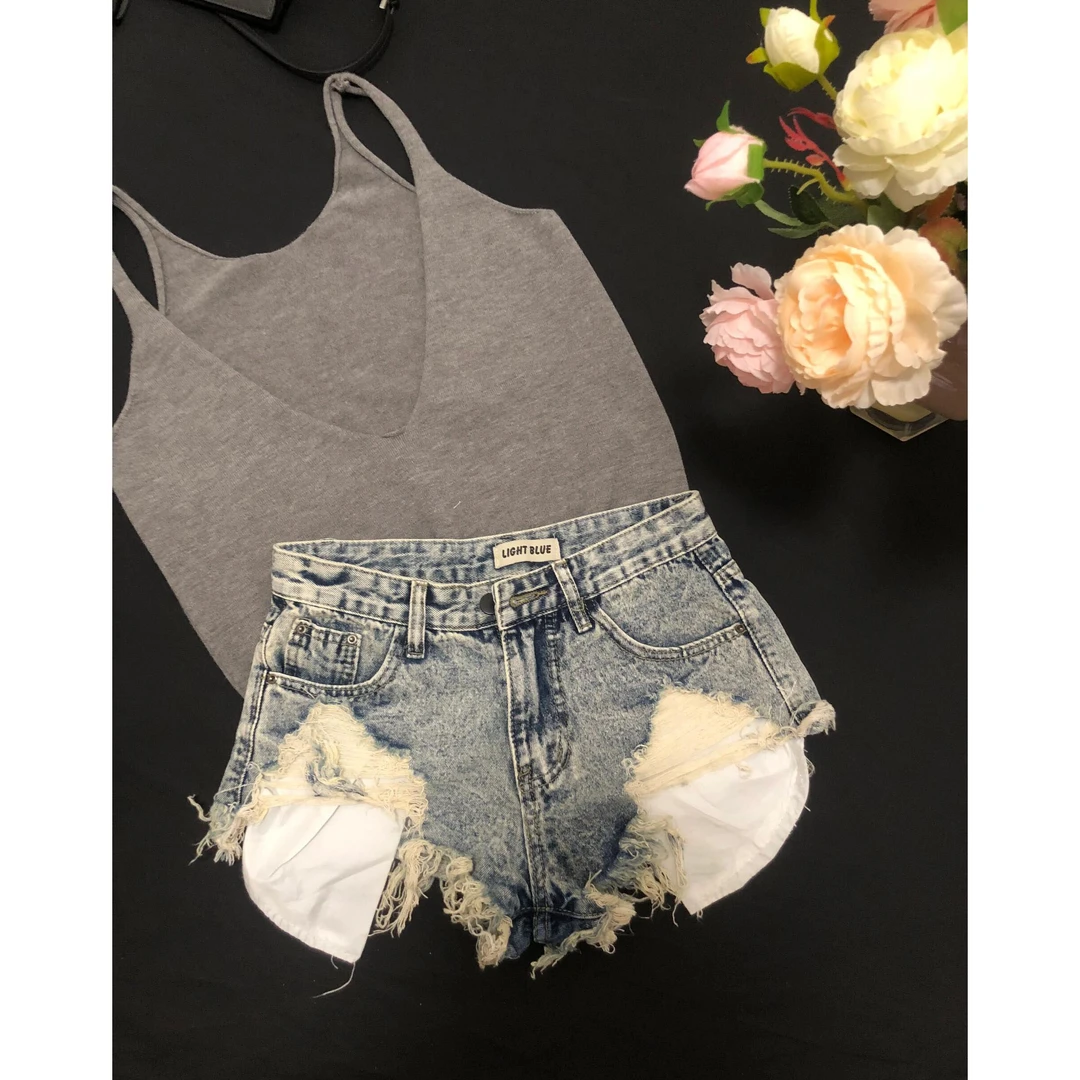 辣妹低腰破洞牛仔短裤女夏季美式外露口袋A字流苏毛边显瘦热裤子