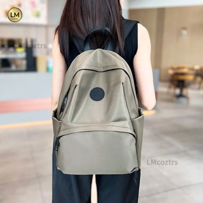 休闲大容量旅行双肩包新款防水轻便百搭通勤背包电脑包大学生书包