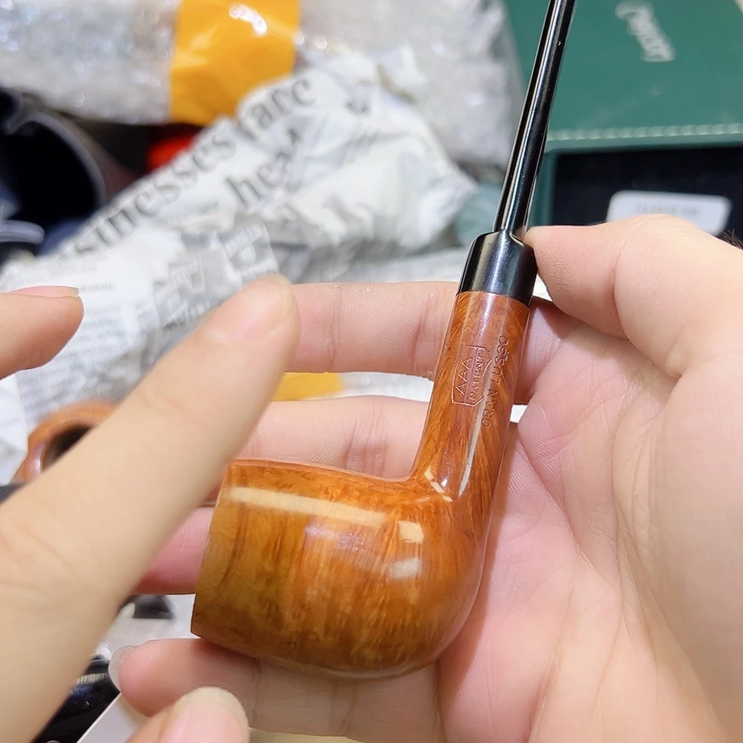 老***。新斗戳记不认识烟斗