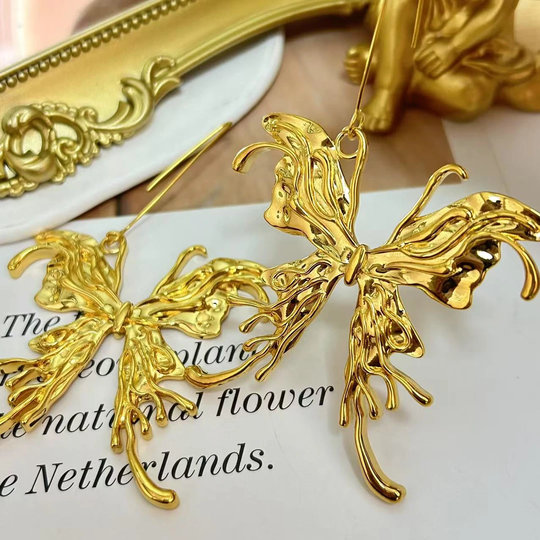 足金999黄金5D无氰时尚硬金气质蝴蝶耳勾22.14