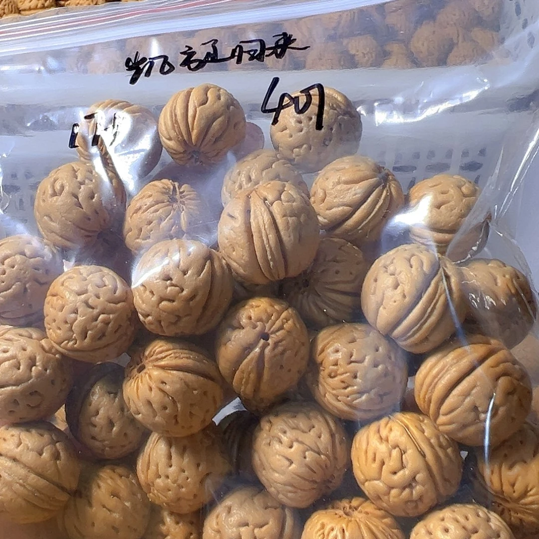 凯***来桃核吊坠高山奶豆桃核散籽