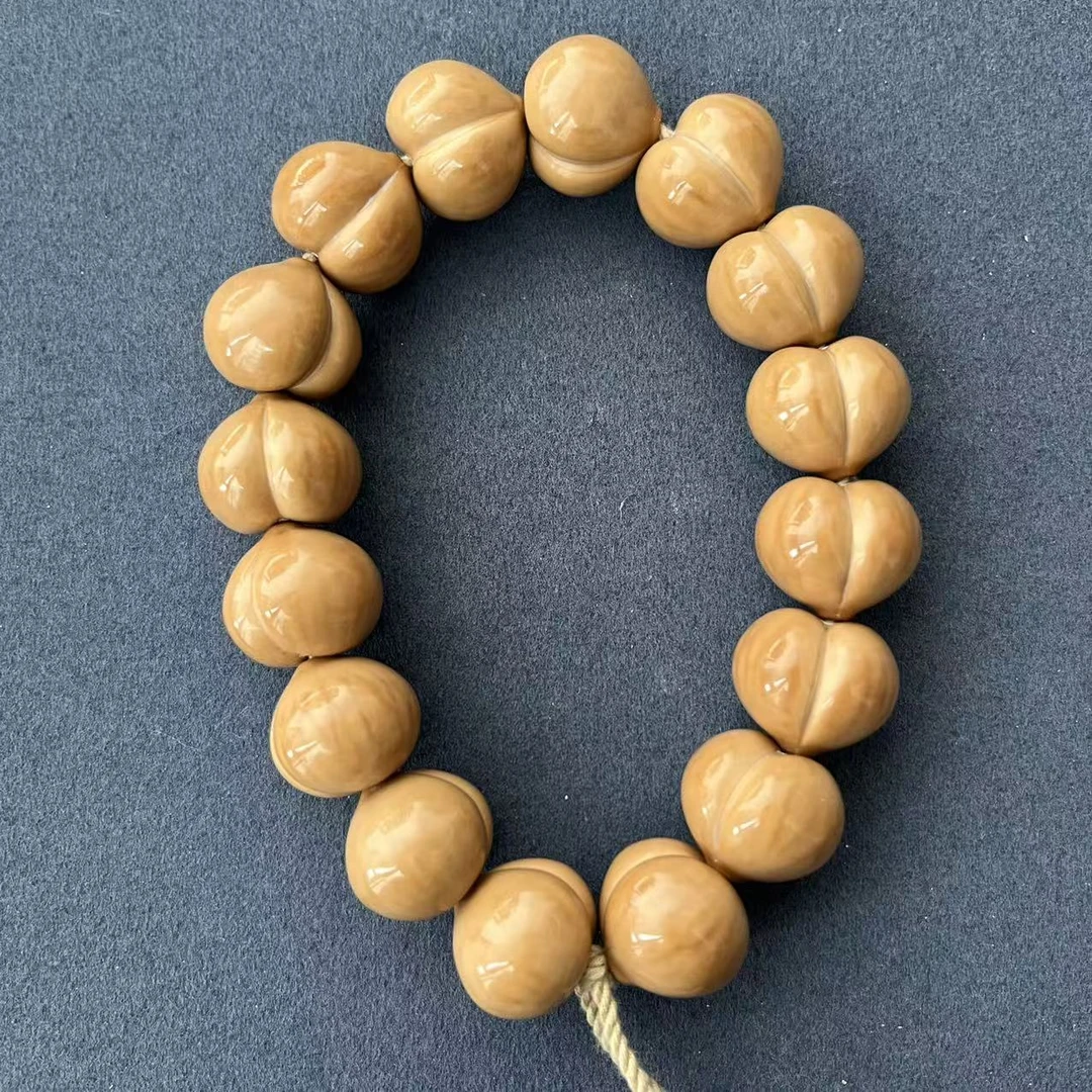 【屁桃17+】高抛手工一条毕业柯基屁桃原色聚宝盆猴头手串手持