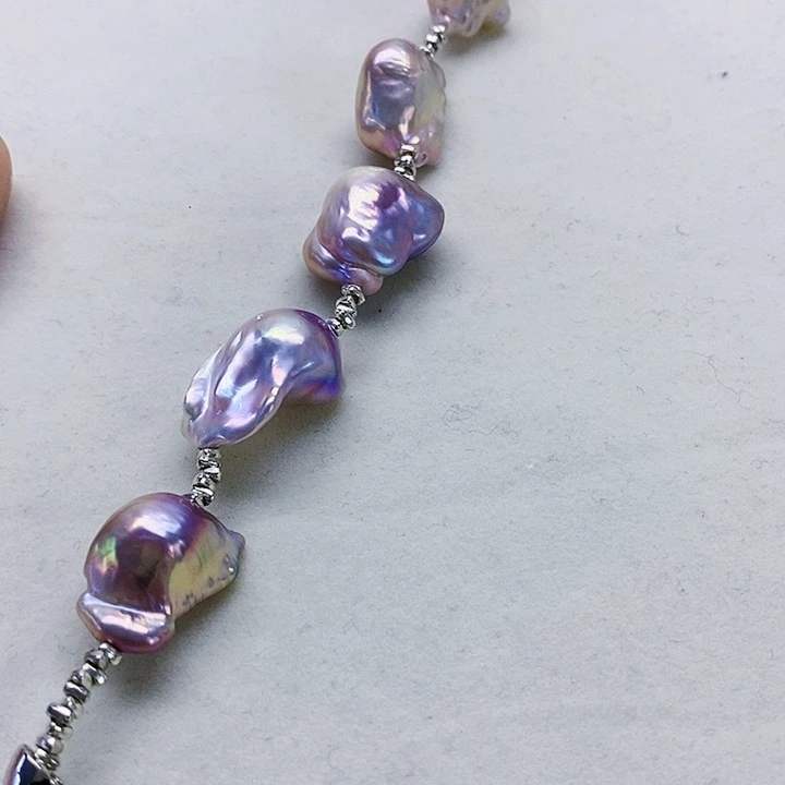 银S925镶嵌耳饰淡水珍珠?**N