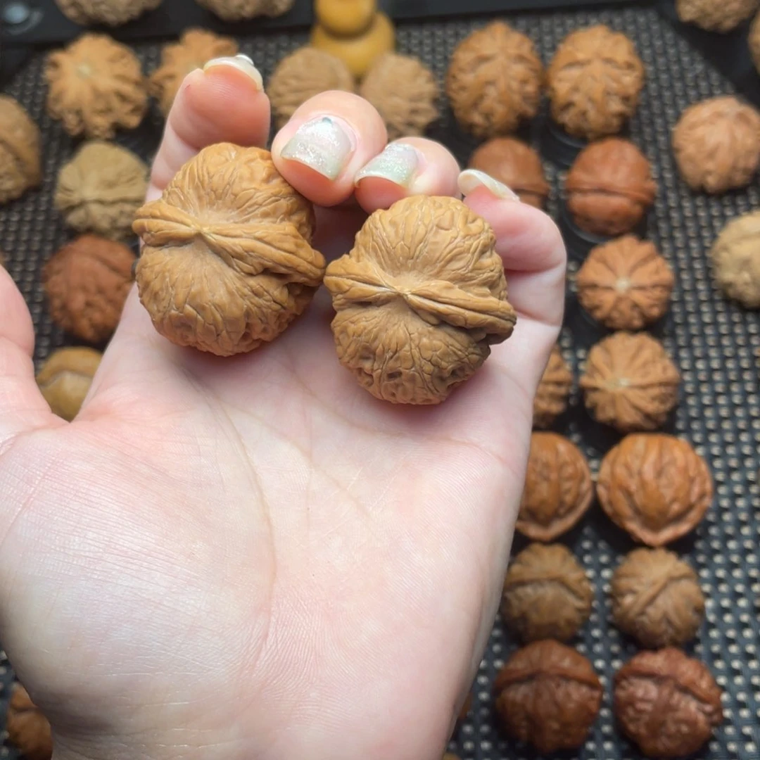 刚***哥文玩把件麻核平谷元宝