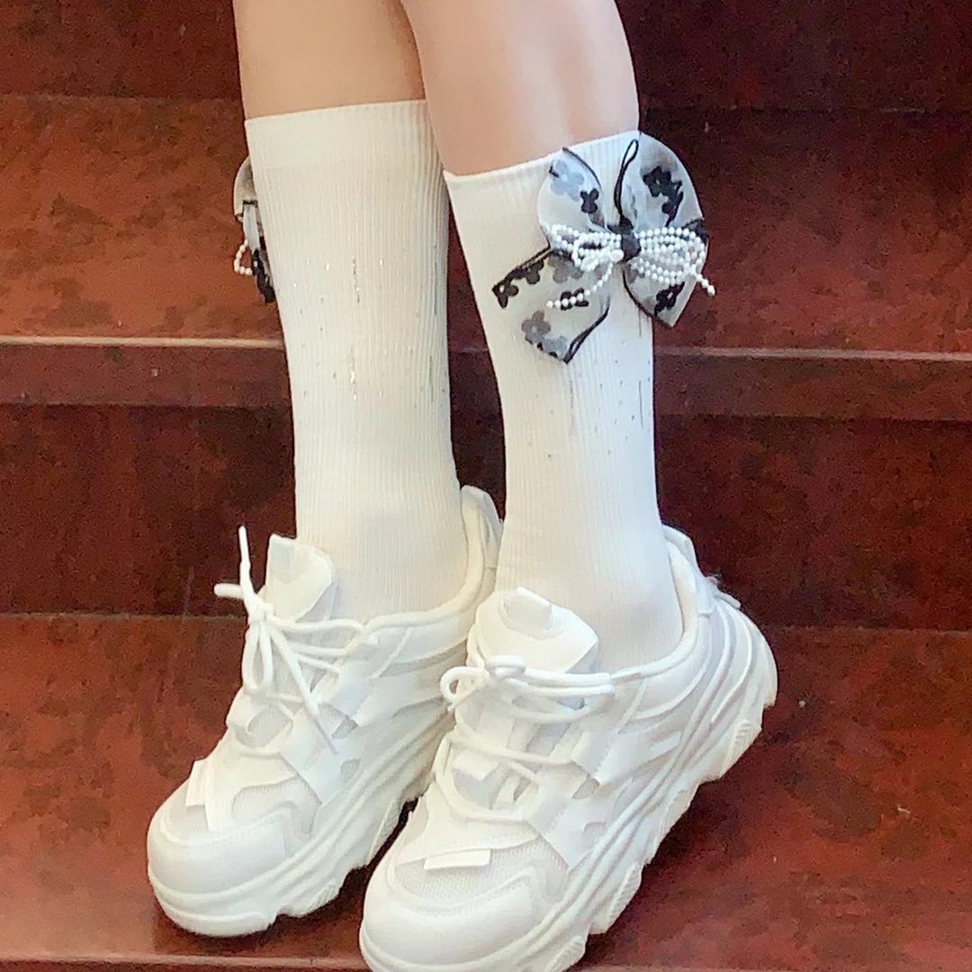 小腿袜小众设计蝴蝶结袜子女夏季薄款中筒袜黑白色少女jk及膝长袜