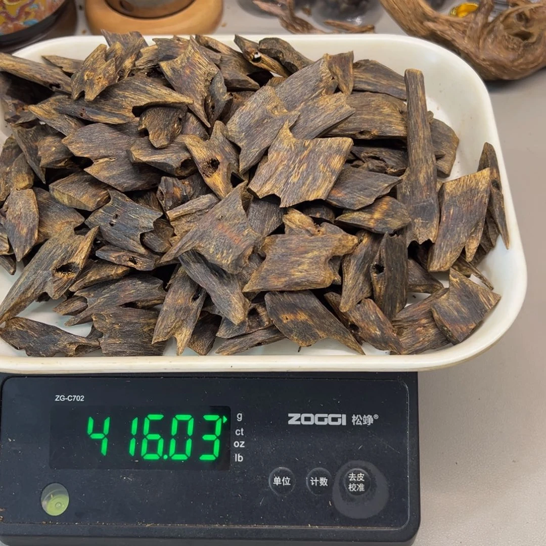 汿***晴沉香沉香碎屑绿棋高油老料糖结416克