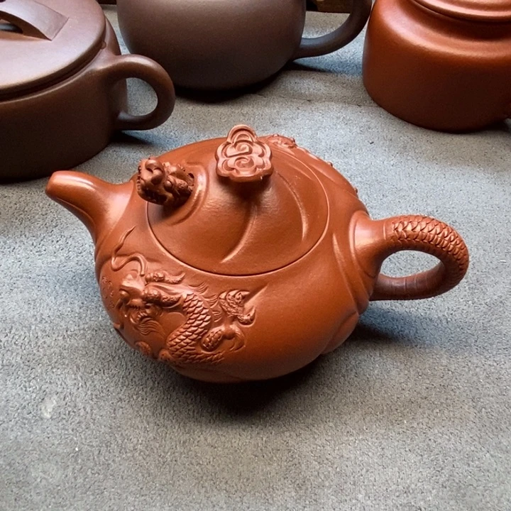 紫砂茶壶山*子鱼化龙（朱泥）