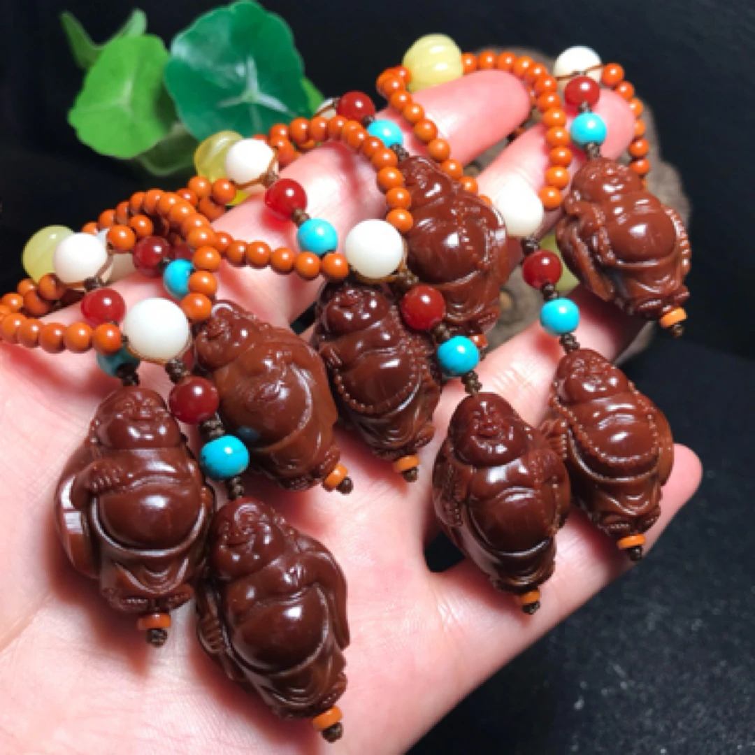 橄榄核雕刻包浆玉化老料弥勒圆珠手捻把件尺寸1.9*2.8cm招财纳福