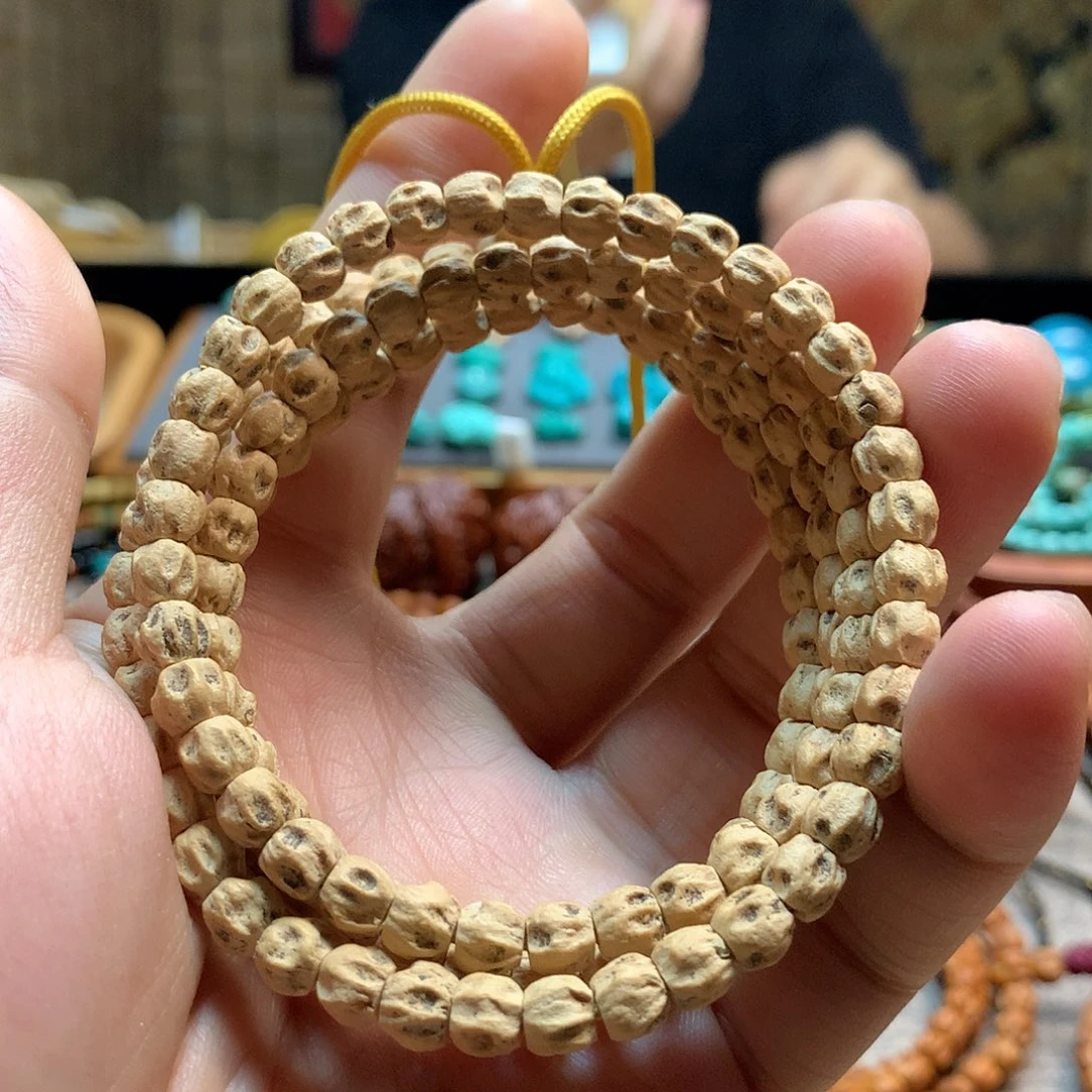 柏香籽/百香籽吊坠热振粉皮满坑鬼脸