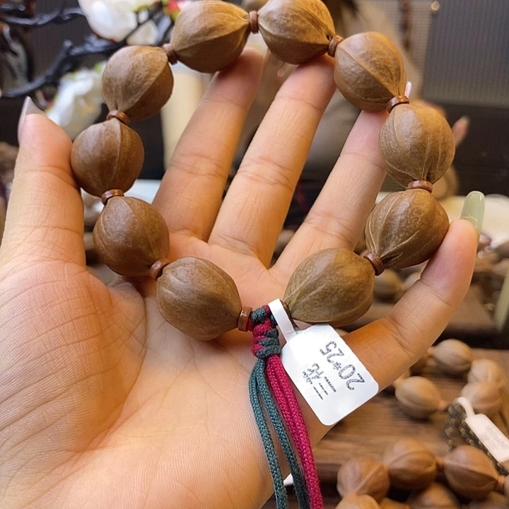 嘿***n吊坠橄榄核梅林铁核