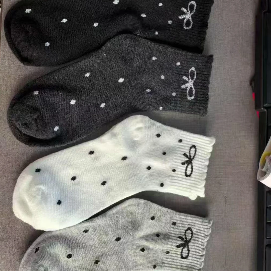 新疆包邮波点花边蝴蝶结春秋中筒男女袜日系网红学生潮袜20双