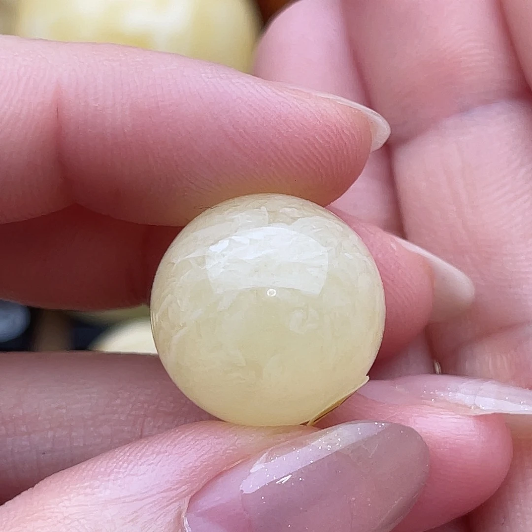 裸石琥珀未镶嵌?****i蜜蜡圆珠鸽