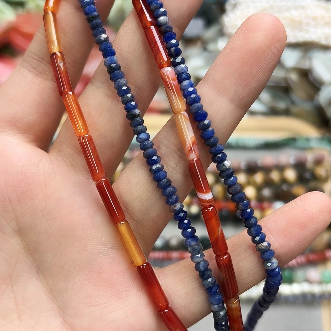 玛瑙/玉髓未镶嵌珠宝半成品两条红玛圆管加蓝纹算切
