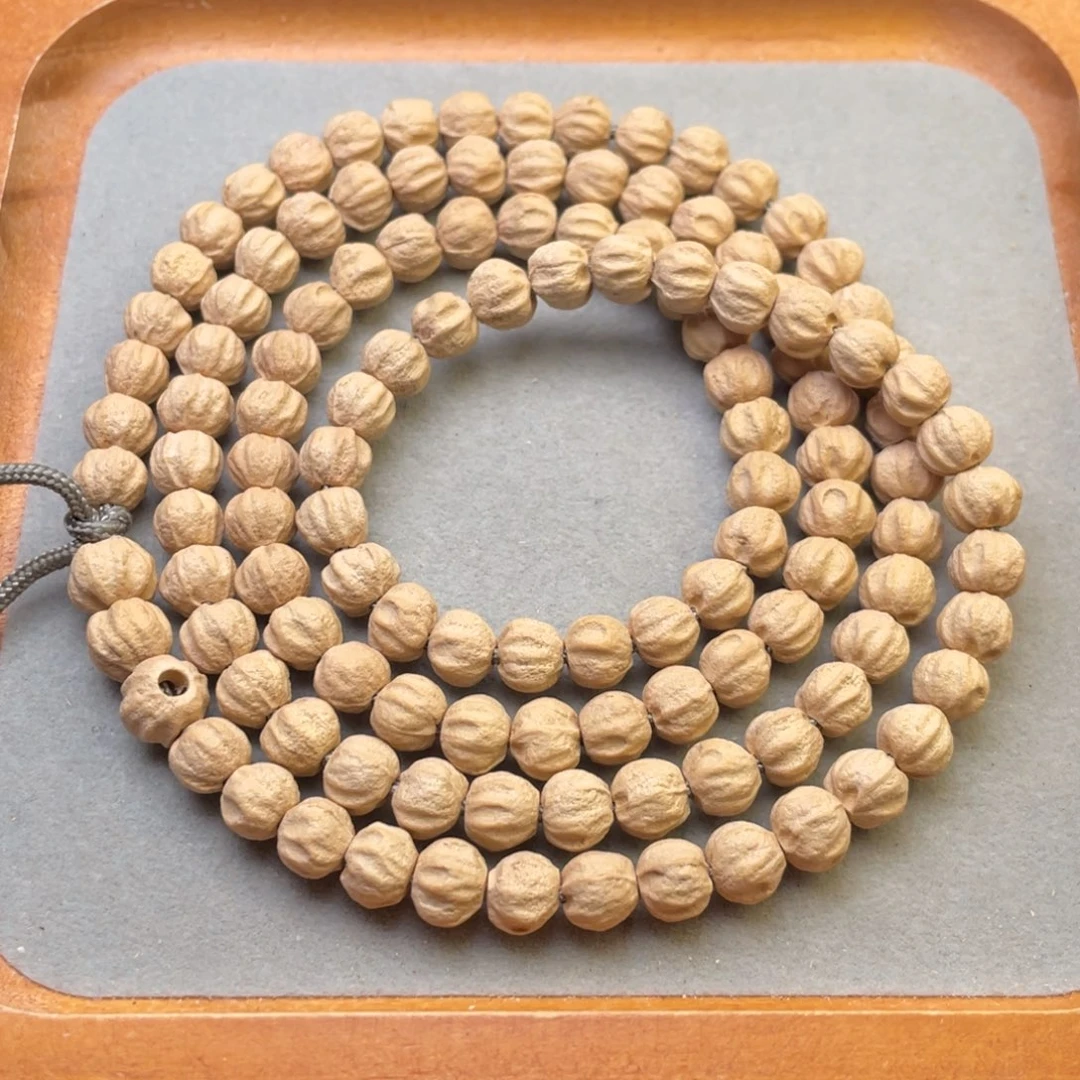 A****D百香籽 玉化皮 鬼脸 莲花 原桩 7.3mm左右