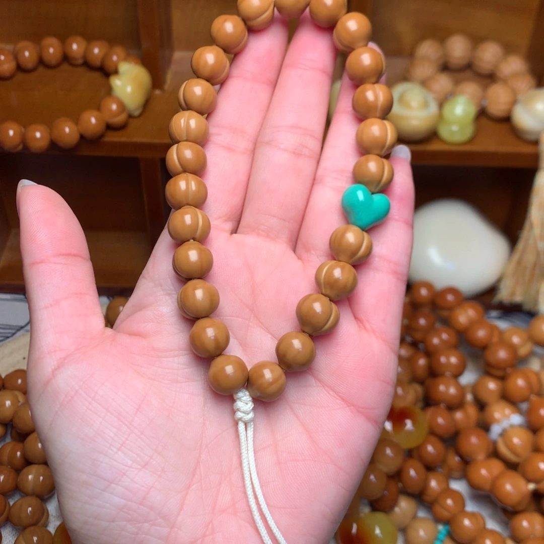 猴头核桃把件10屁桃手持爱心