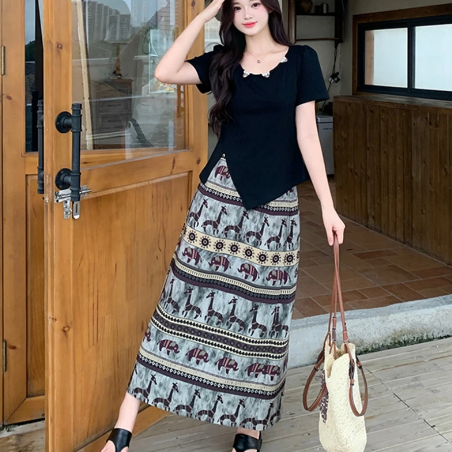 HH035大码女装2025夏装新款胖mm休闲套装别致短袖上衣印花半身裙