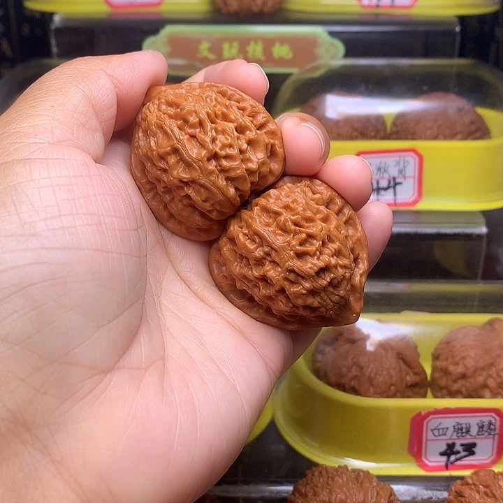 吊坠文玩核桃萬**缰金牛