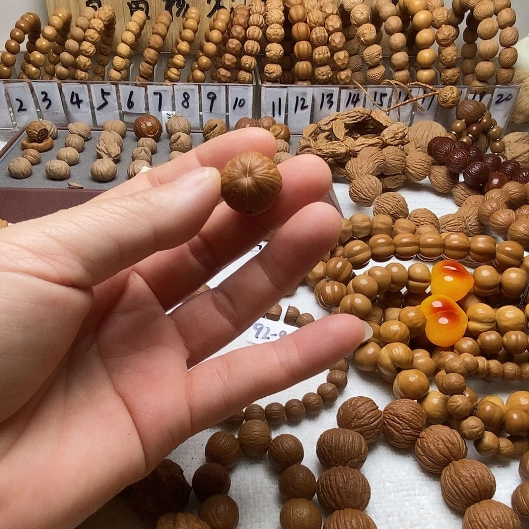 坚***好猴头核桃手串聚宝盆三通