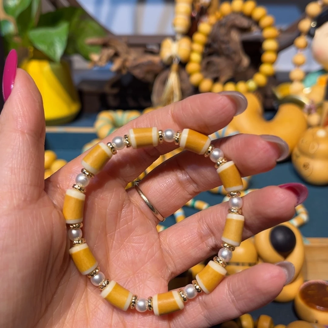 骨料镶口竹节手串。