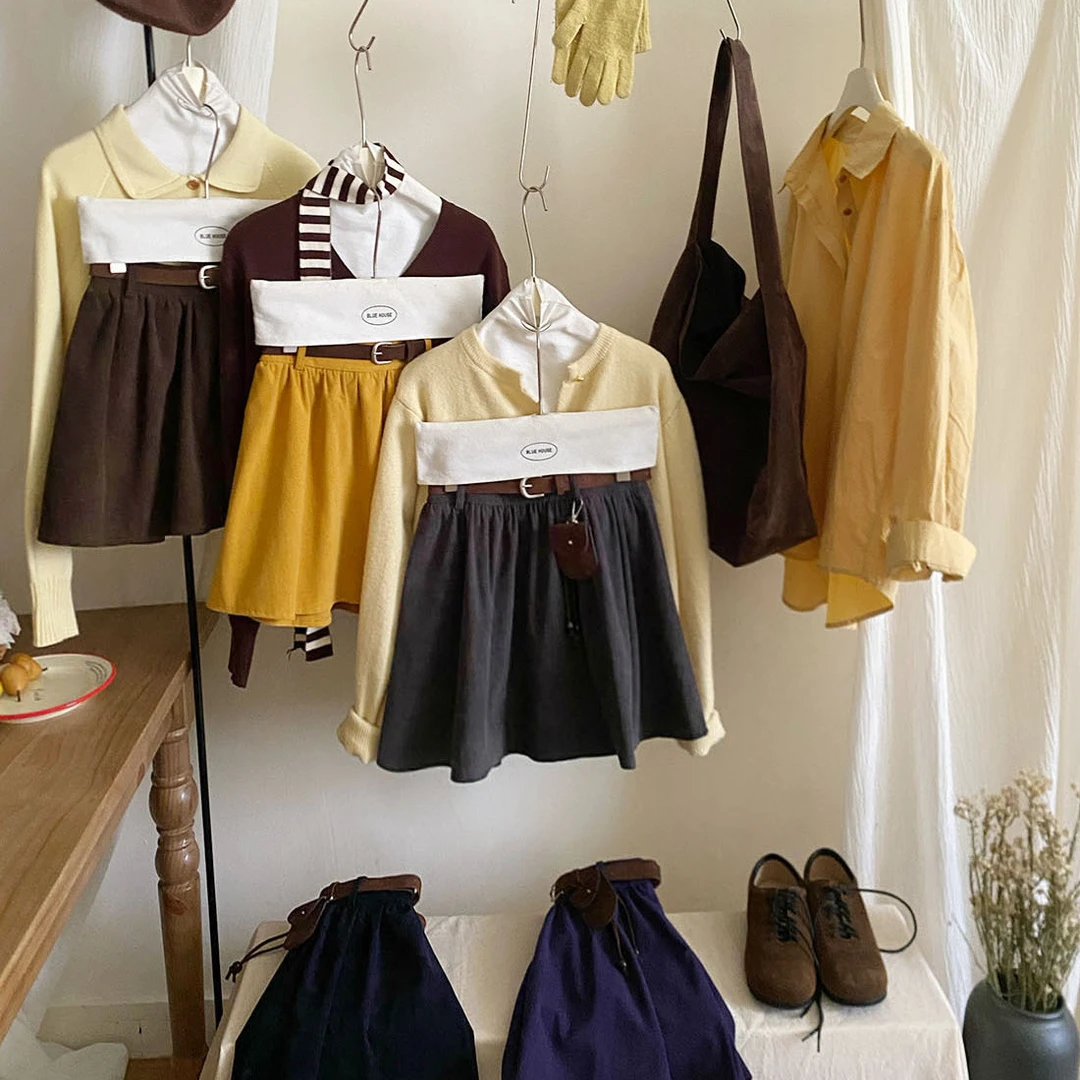 韩系芒果黄搭灯芯绒半身裙女秋冬niu系捏着松紧高腰防走光A字短裙