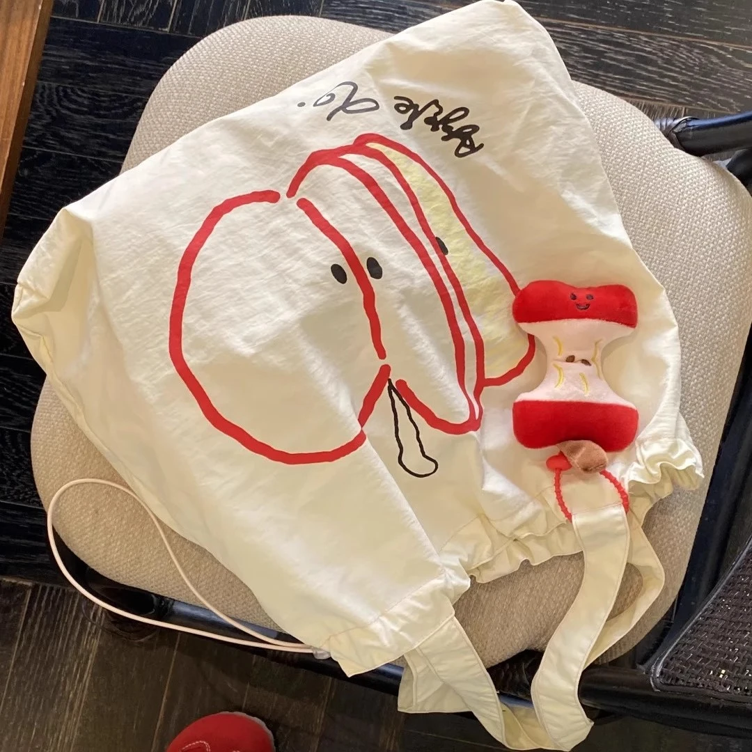 苹果新款抽绳帆布包学生轻便通勤百搭单肩包小众休闲简约托特包gh