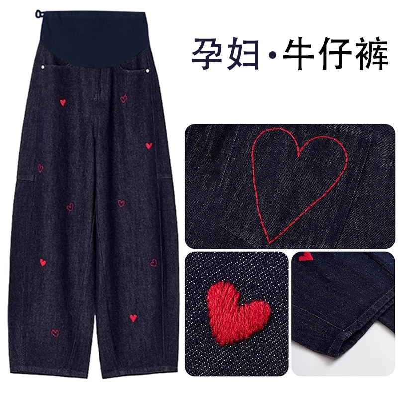 新款 孕妇牛仔显瘦韩版显瘦丹宁蓝牛仔桃心刺绣孕妇阔腿弯刀裤