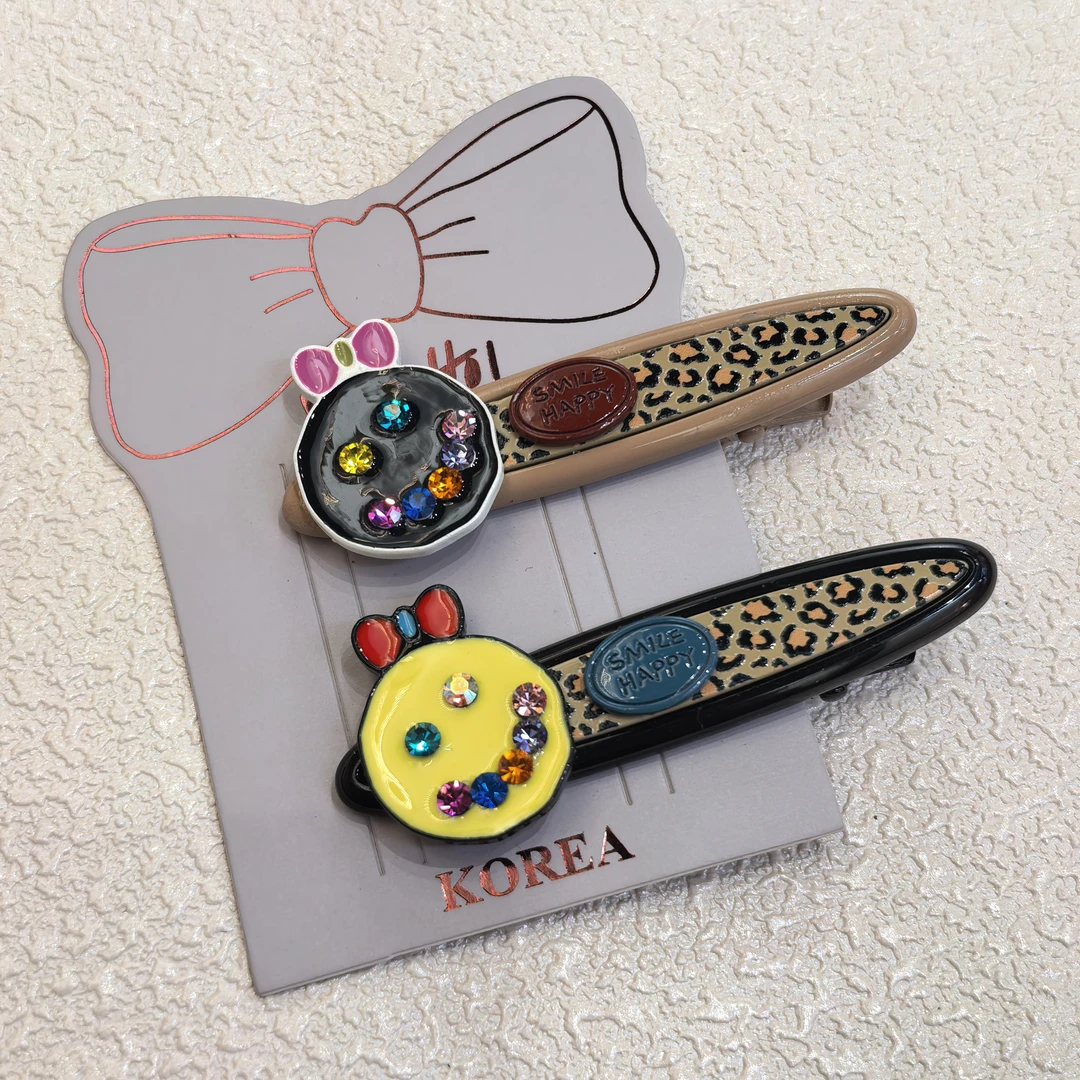 E309黄黑色笑脸闪闪豹纹边夹一对