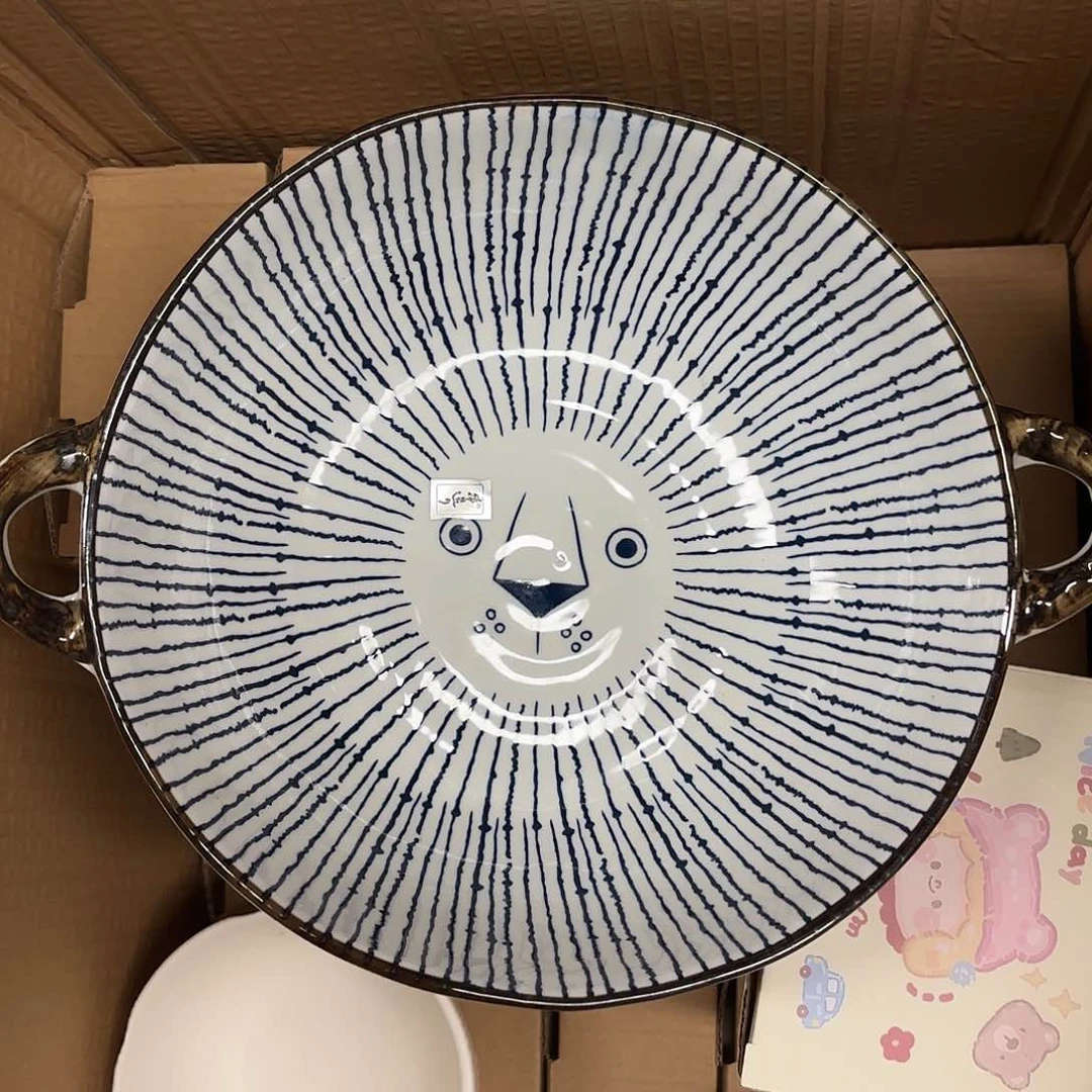 白瓷狮子双耳汤盆