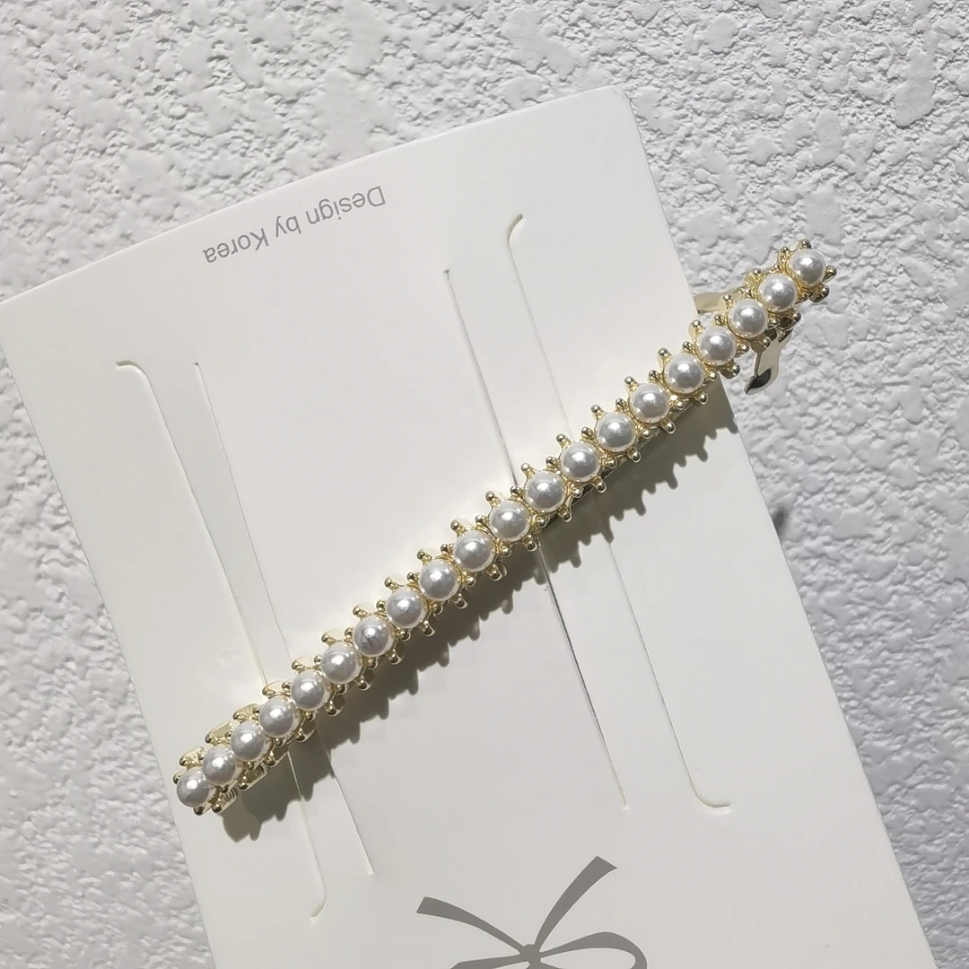 D107白色珠卷一字弹簧夹