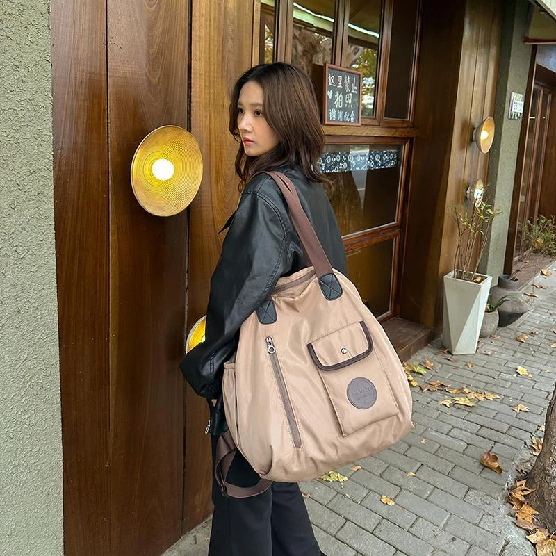 2025新款大容量双肩包女旅行背包旅游轻便书包短途防水外出妈咪包