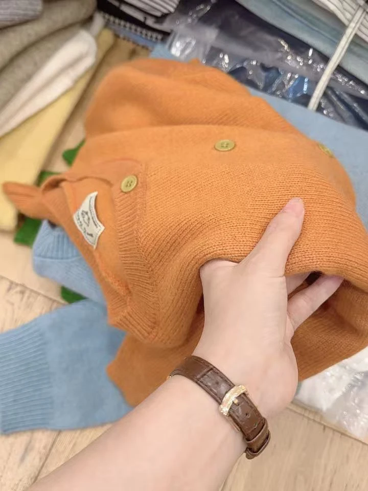 七言家质感升级！ins穿搭高品软糯南瓜橘开衫毛衣@
