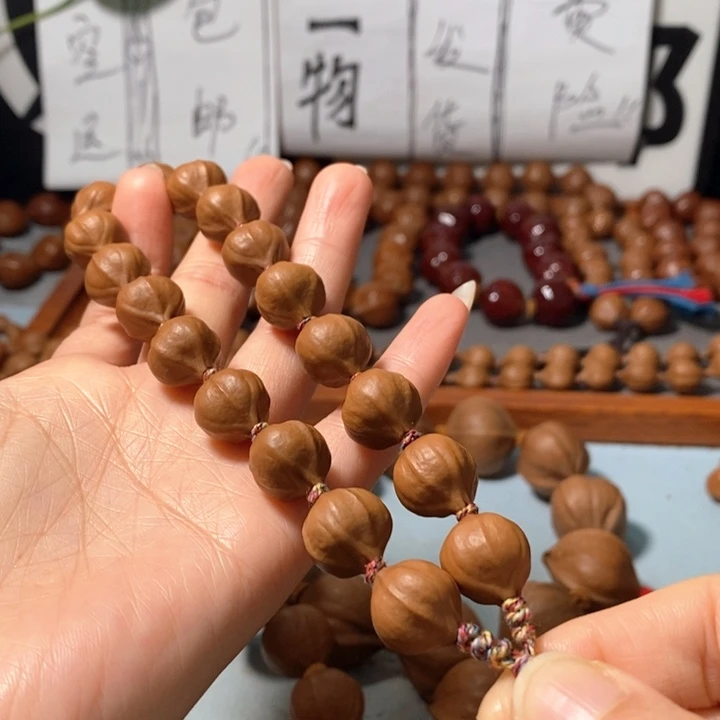 橄榄核手串5131精品蒜头小红核16+2颗