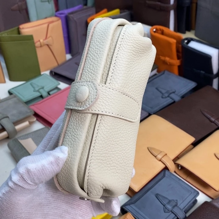 头层牛皮笔袋特价款