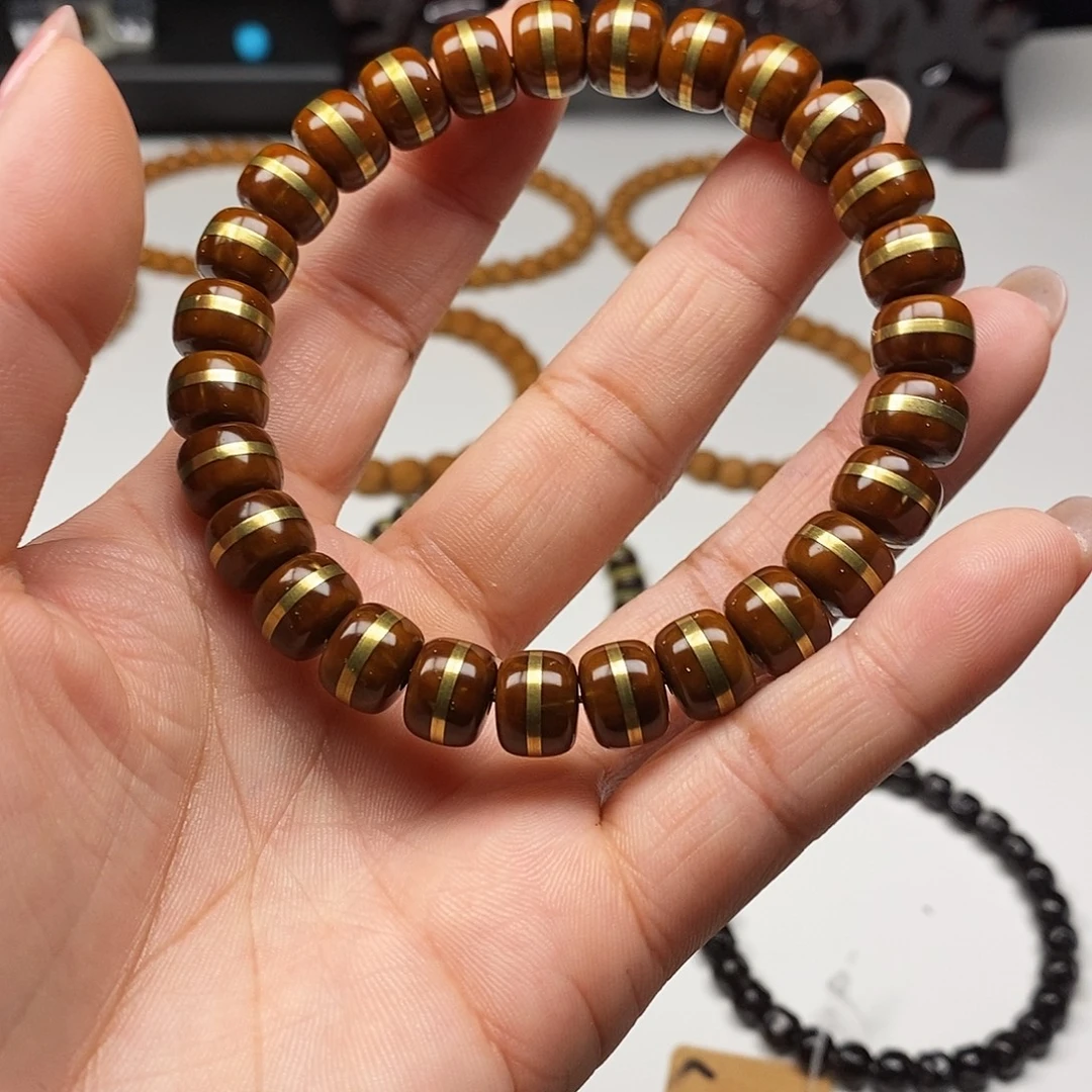 马***彬猴头核桃手串紫金鼠