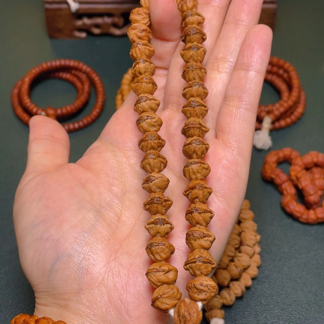 柏香籽/百香籽手串红牙龅牙口手持