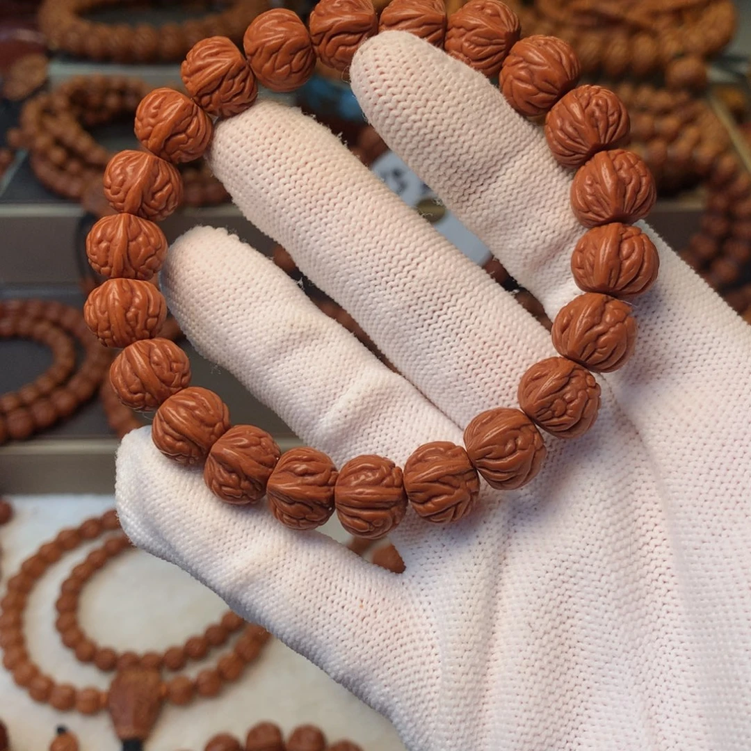 魏***下桃核手串秦岭龙纹