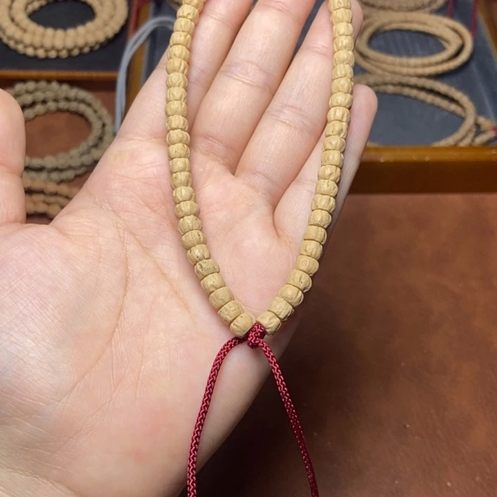 柏香籽/百香籽吊坠手持