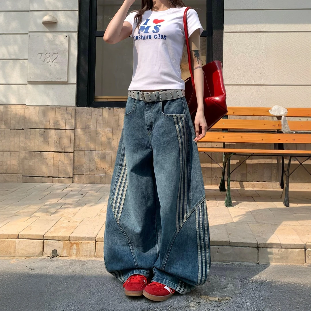 大码美式复古水洗解构弯刀牛仔裤女设计感三条杠条纹拼接阔腿裤潮