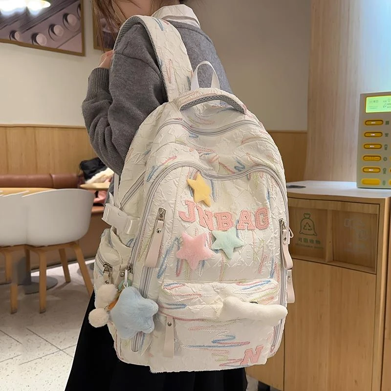 儿童书包女生小学生一年级初中生高中高颜值字母背包大学生双肩包