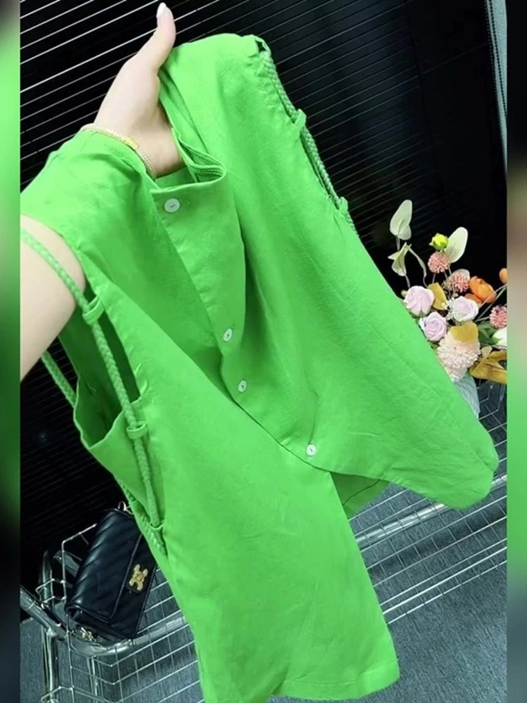 欧货时髦设计感小众绿色斜排扣不规则亚麻无袖上衣夏季薄款背心女