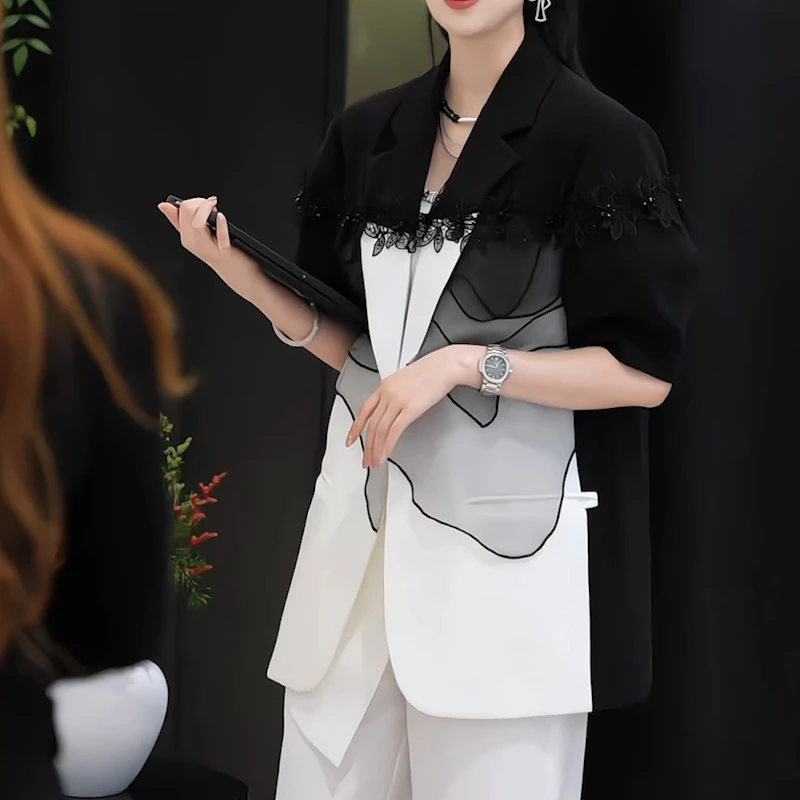 设计感小众黑白拼接上衣女春秋新款欧货气质时尚洋气短袖坎肩外套